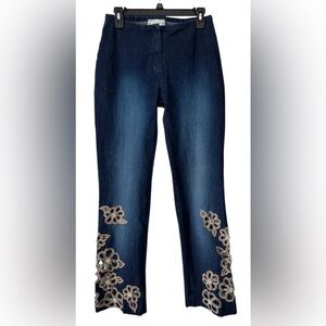 BASIX II women’s 8 dark washed blue jeans with a floral design on the legs